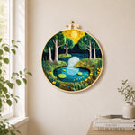 Moonlit forest lake needle felt wall art displayed in a bright home interior