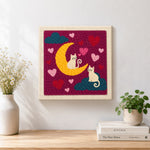 Finished moonlit white cats on clouds artwork displayed on a wall