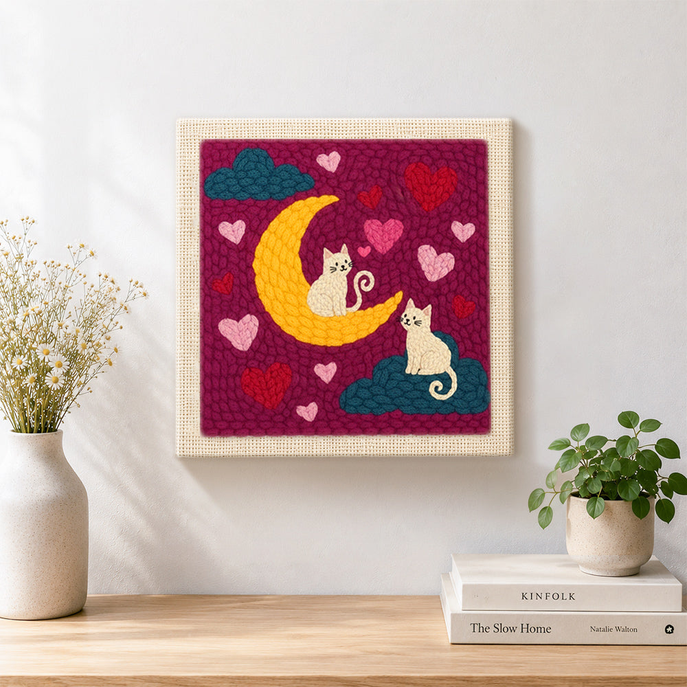 Finished moonlit white cats on clouds artwork displayed on a wall