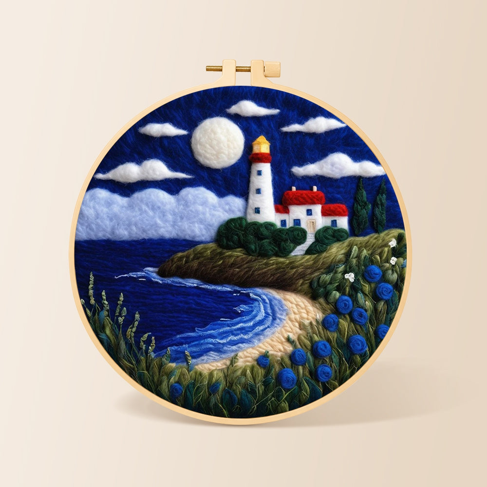 Moonlit white lighthouse and blue roses needle felting kit for beginners with a round wooden frame