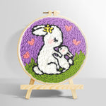 Mother rabbit carrying baby bunny punch needle kit for beginners