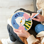 Creating handmade motivated duck with fist pump punch needle artwork