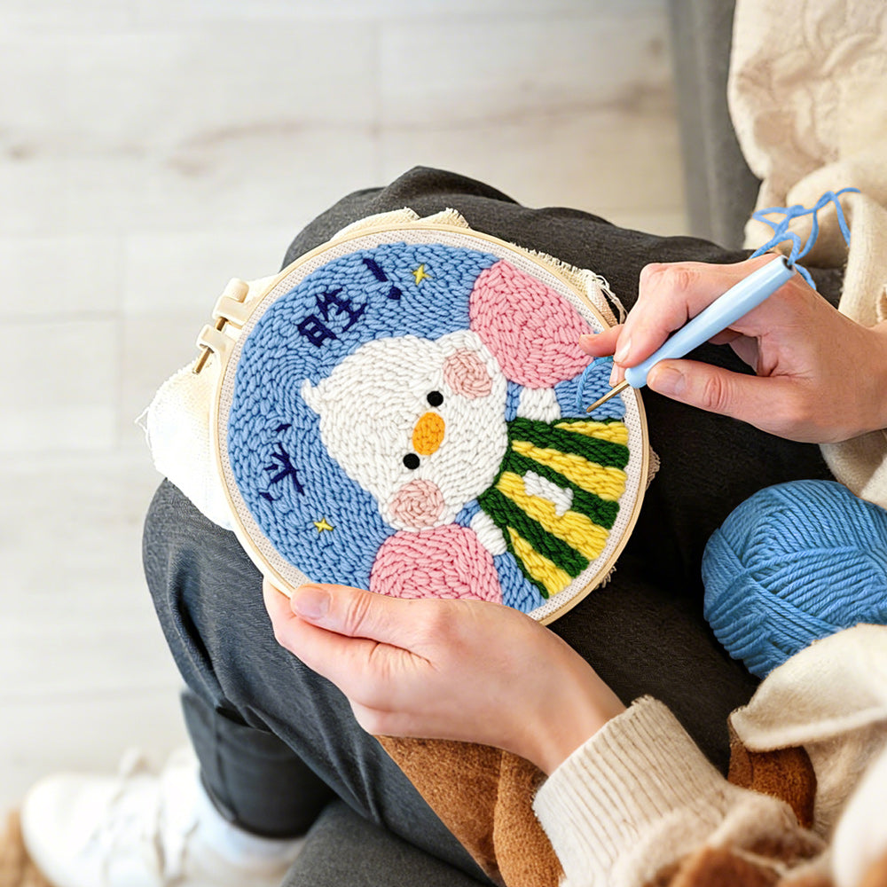 Creating handmade motivated duck with fist pump punch needle artwork