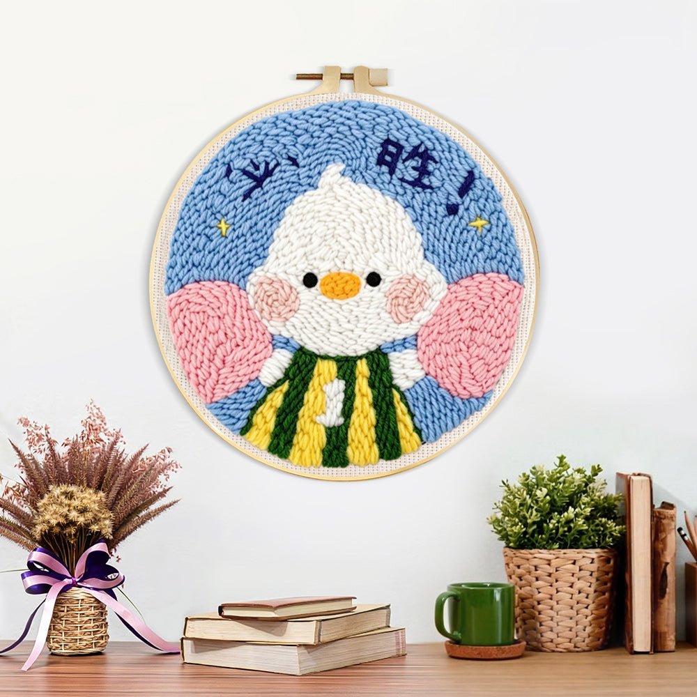 Finished motivated duck with fist pump artwork displayed on a wall
