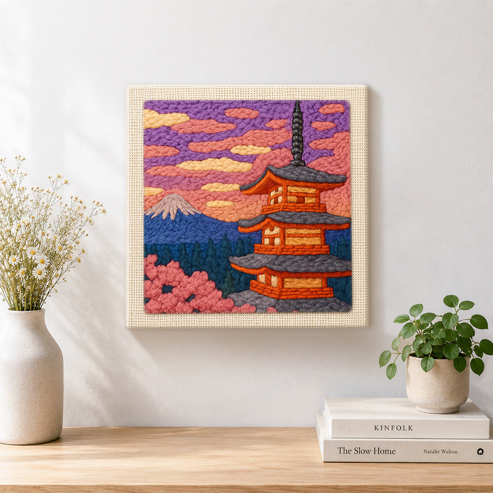 Finished mount fuji and pagoda artwork displayed on a wall