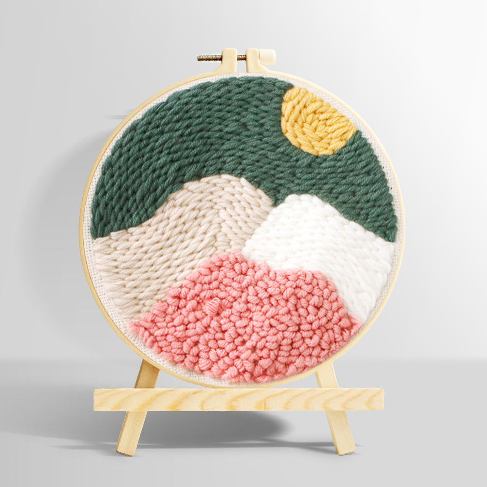Mountain landscape with sun punch needle kit for beginners