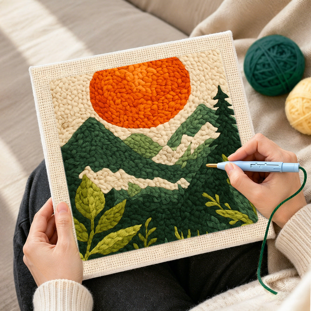 Creating handmade mountain view and sunset punch needle artwork