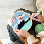 Creating handmade mountain with snow and flowers punch needle artwork