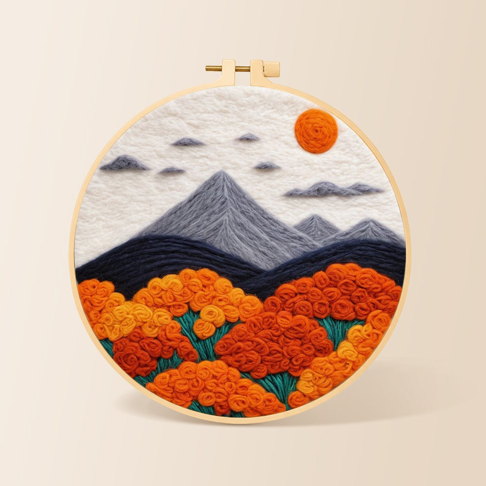 Mountains and lush orange roses needle felting kit for beginners with a round wooden frame
