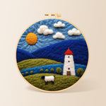 Mountains and white tower at night needle felting kit for beginners with a round wooden frame