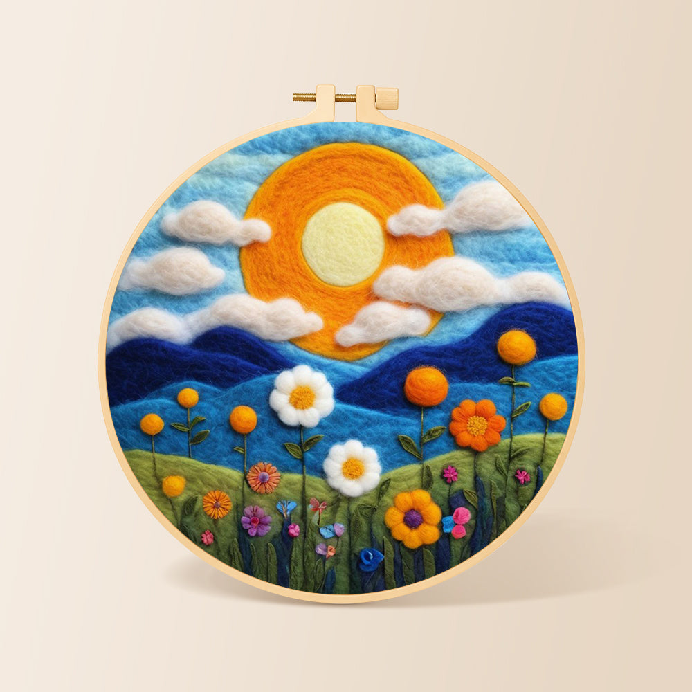 Mountains and wildflowers at sunset needle felting kit for beginners with a round wooden frame