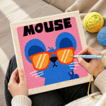 Creating handmade mouse with sunglasses punch needle artwork