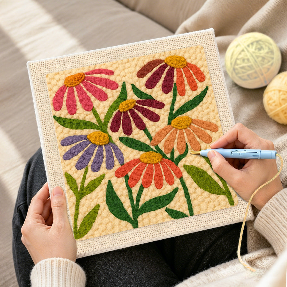 Creating handmade multicolour daisies punch needle artwork