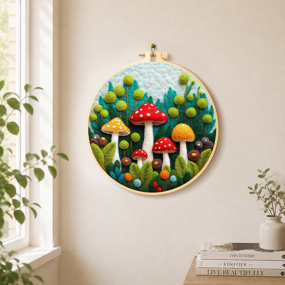 Mushroom group in forest needle felt wall art displayed in a bright home interior