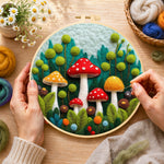 Creating the mushroom group in forest wool painting by hand with a felting needle