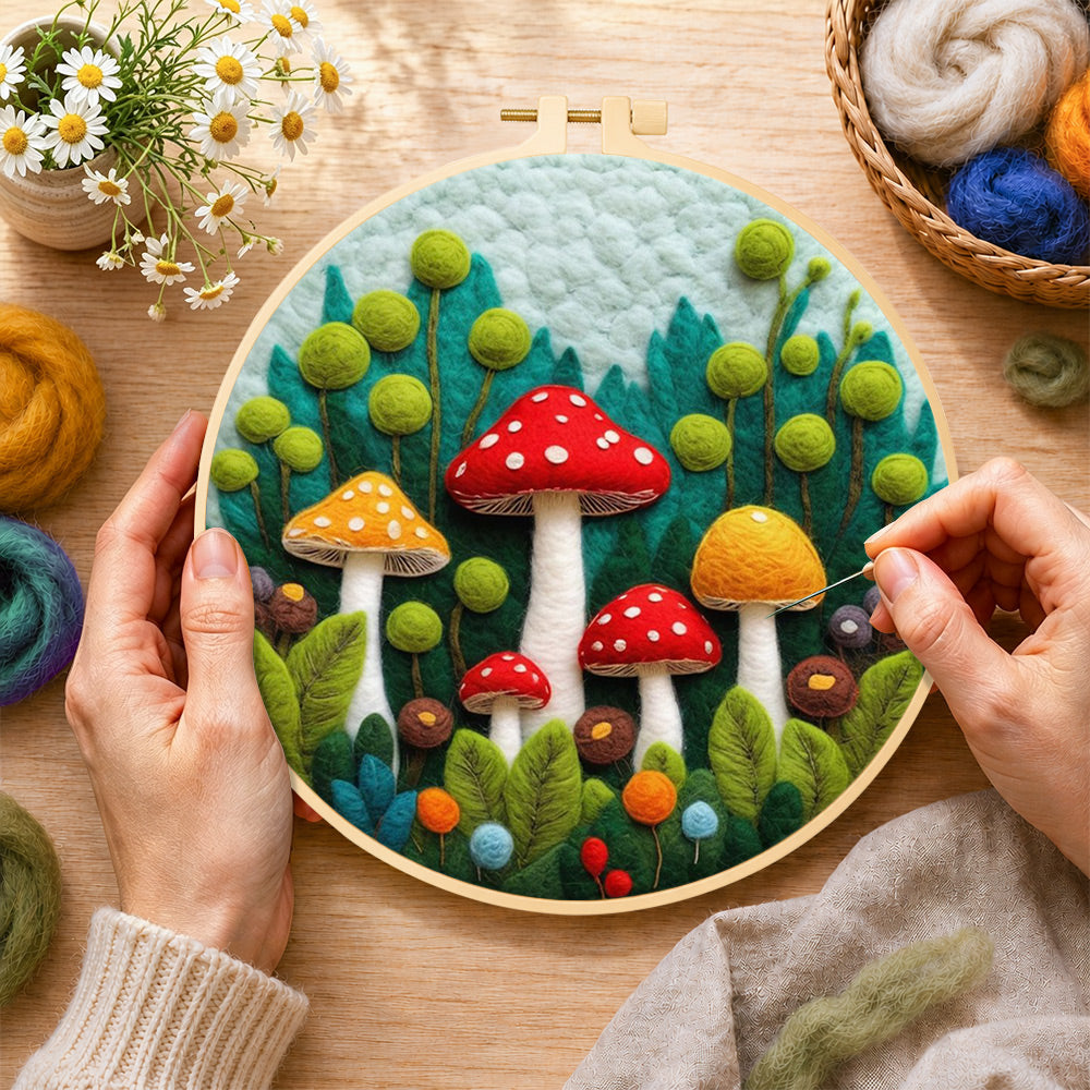 Creating the mushroom group in forest wool painting by hand with a felting needle