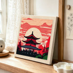 Mystical eastern temple at dusk punch needle artwork displayed on a table