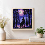Finished mystical wolf howling at the moon artwork displayed on a wall