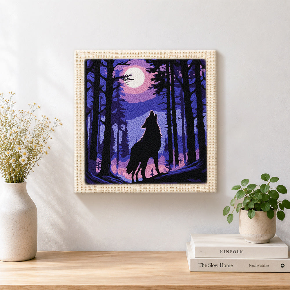 Finished mystical wolf howling at the moon artwork displayed on a wall