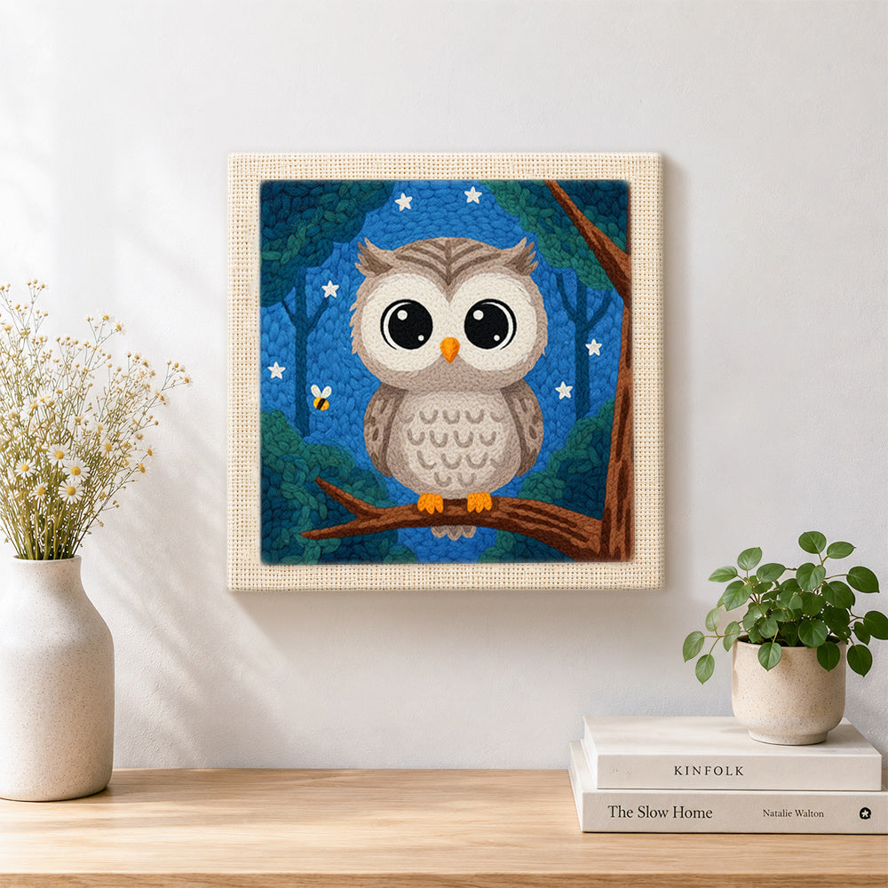 Finished night sky forest owl artwork displayed on a wall