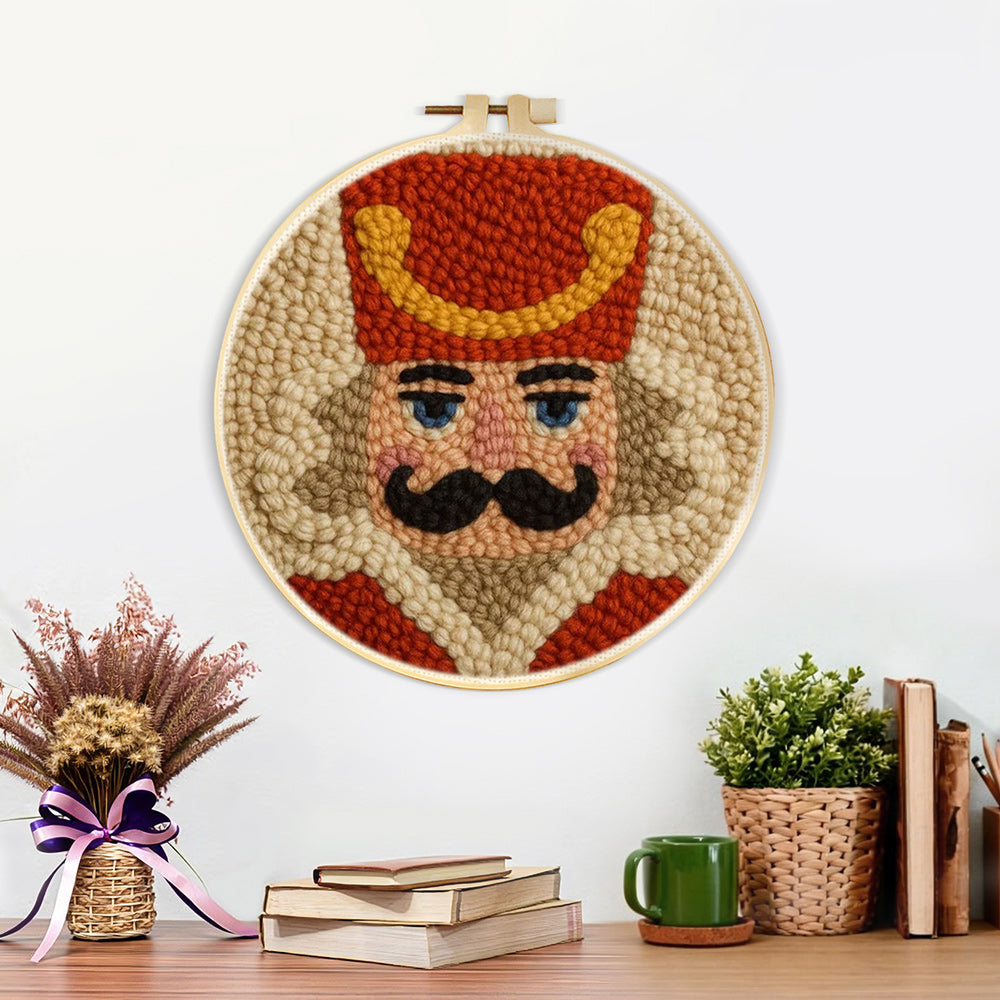 Finished nutcracker soldier portrait artwork displayed on a wall