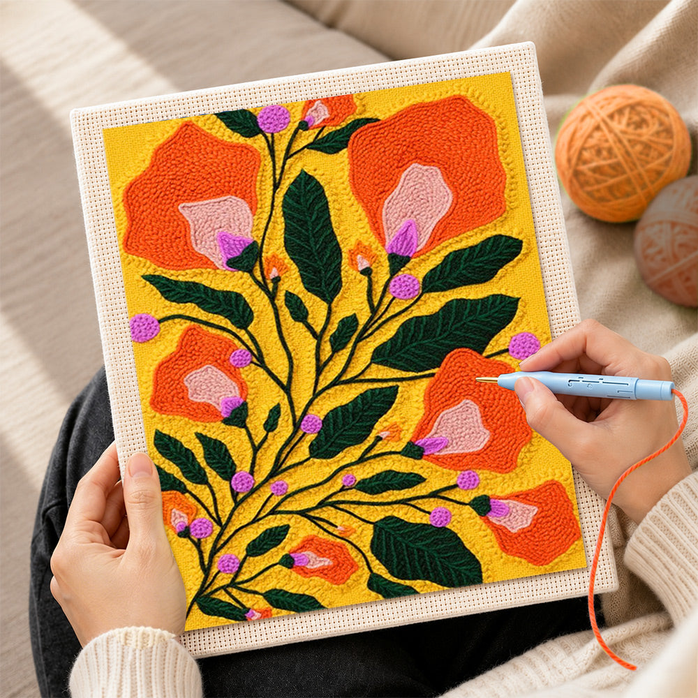 Creating handmade orange bell flowers punch needle artwork