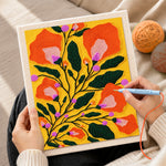 Creating handmade orange bell flowers punch needle artwork