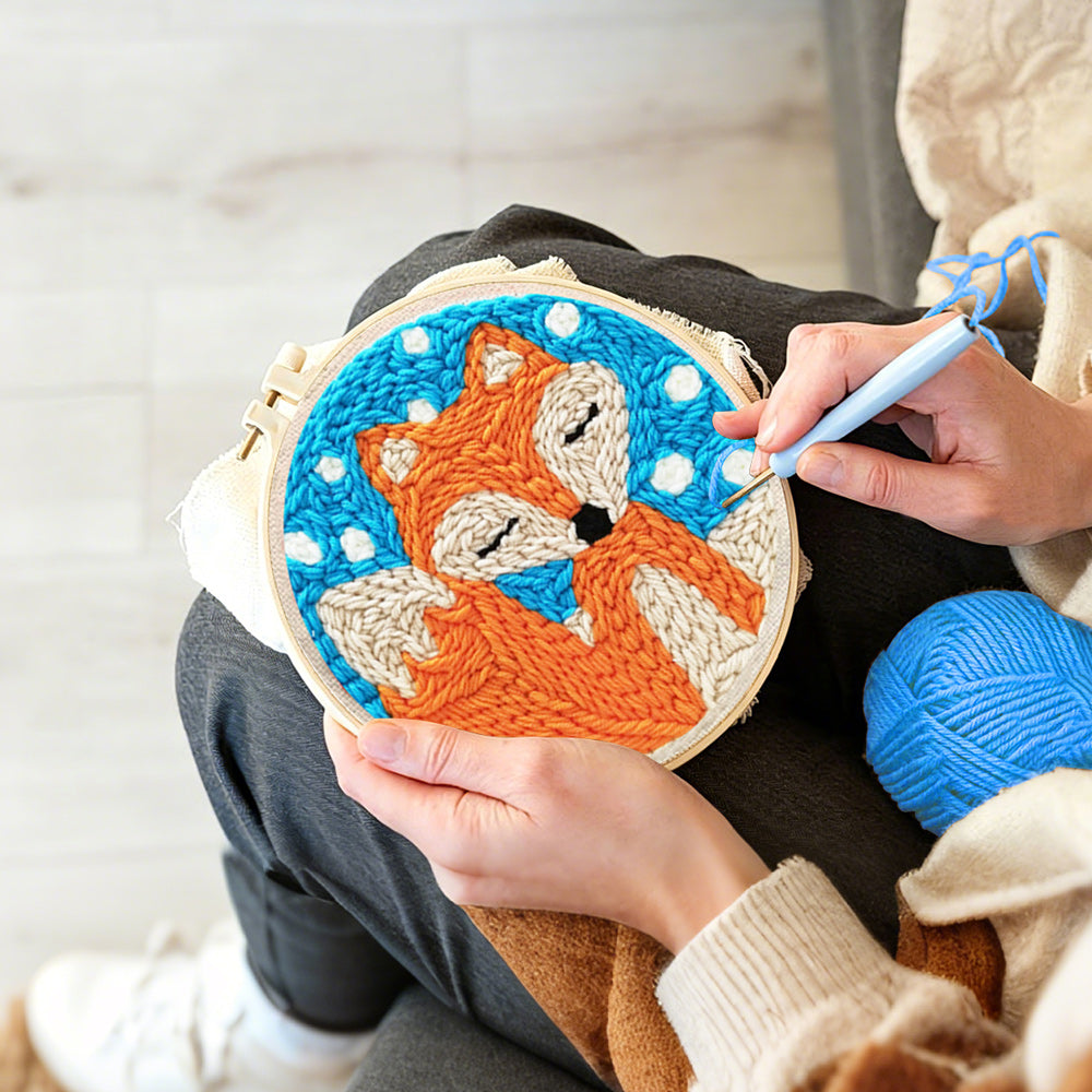 Creating handmade orange fox punch needle artwork