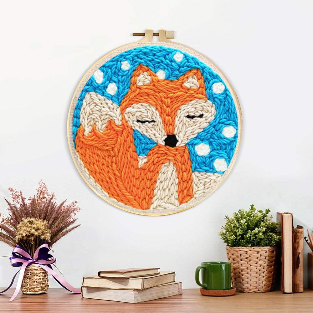 Finished orange fox artwork displayed on a wall
