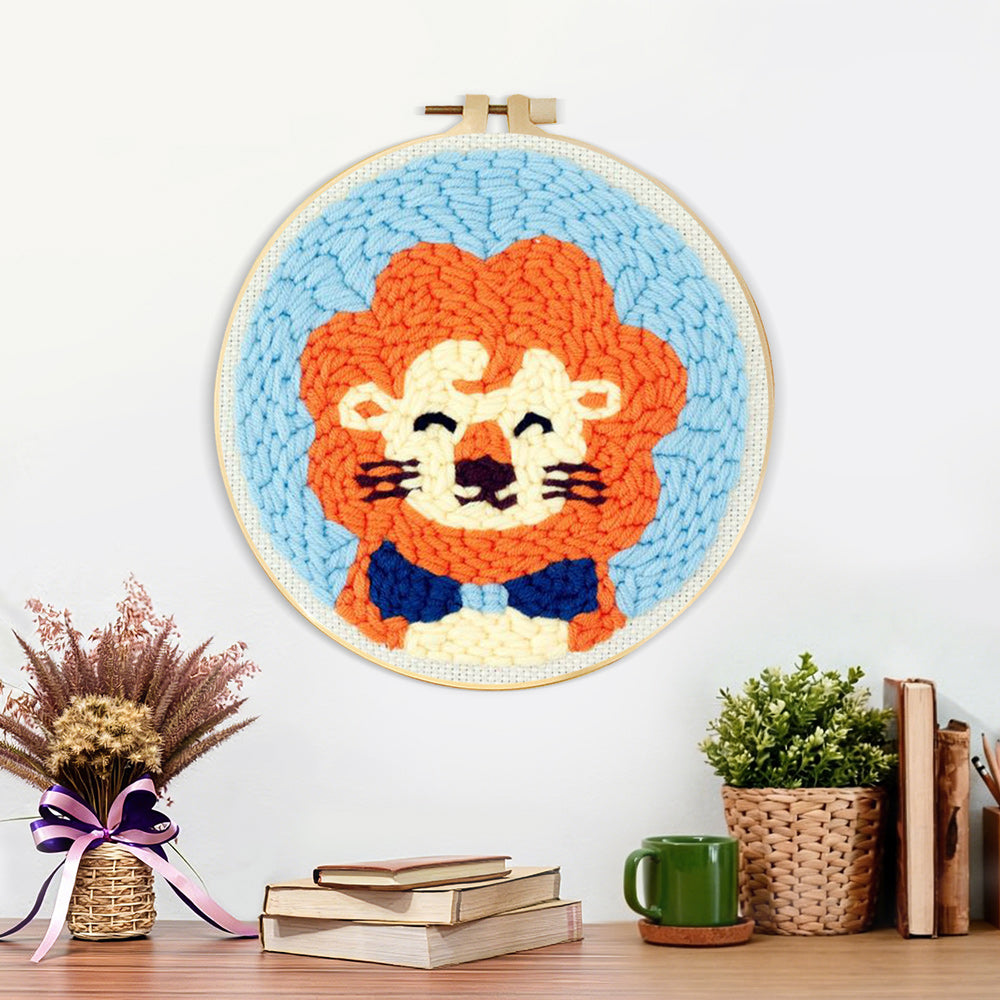 Finished orange-maned cartoon lion artwork displayed on a wall