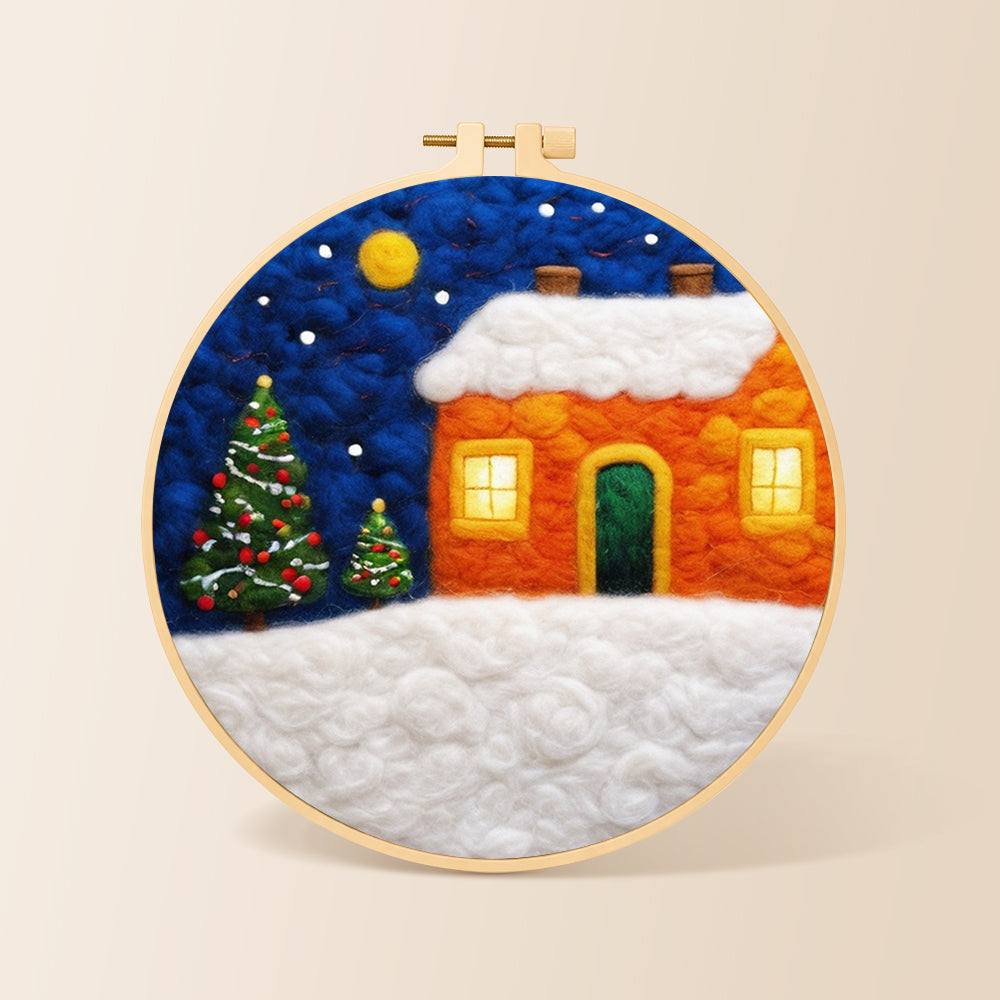 Orange snowy house and christmas trees needle felting kit for beginners with a round wooden frame