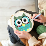 Creating handmade owl with glasses punch needle artwork