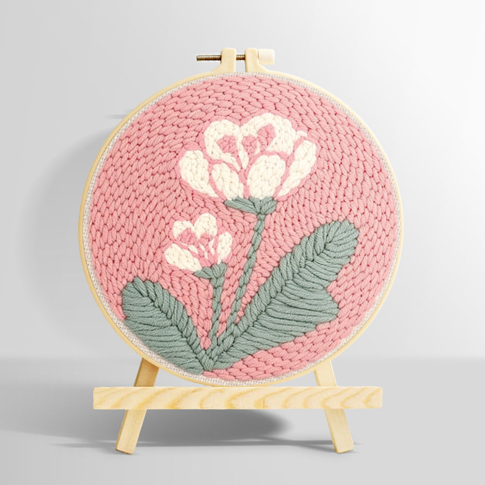 Pale pink background with white flowers punch needle kit for beginners
