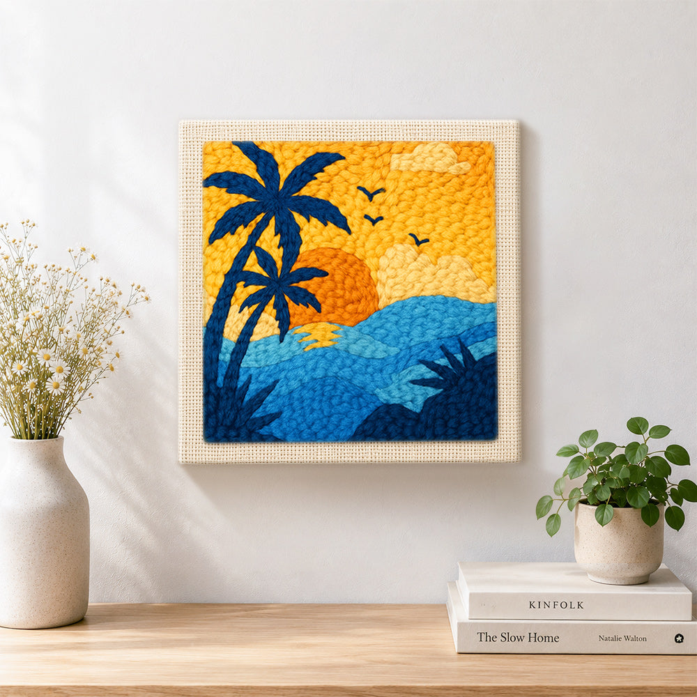 Finished palm tree and ocean artwork displayed on a wall