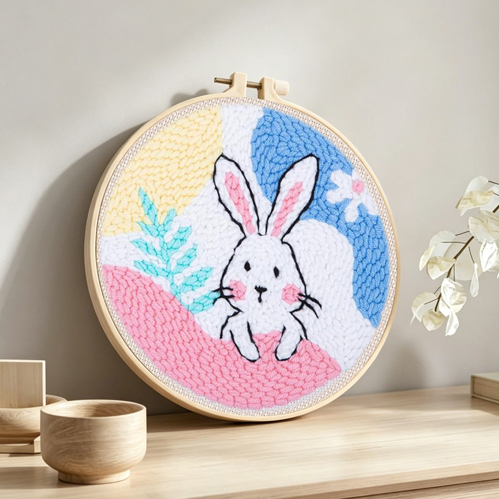 Pastel bunny dream punch needle artwork displayed on a table
