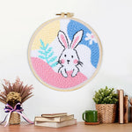 Finished pastel bunny dream artwork displayed on a wall