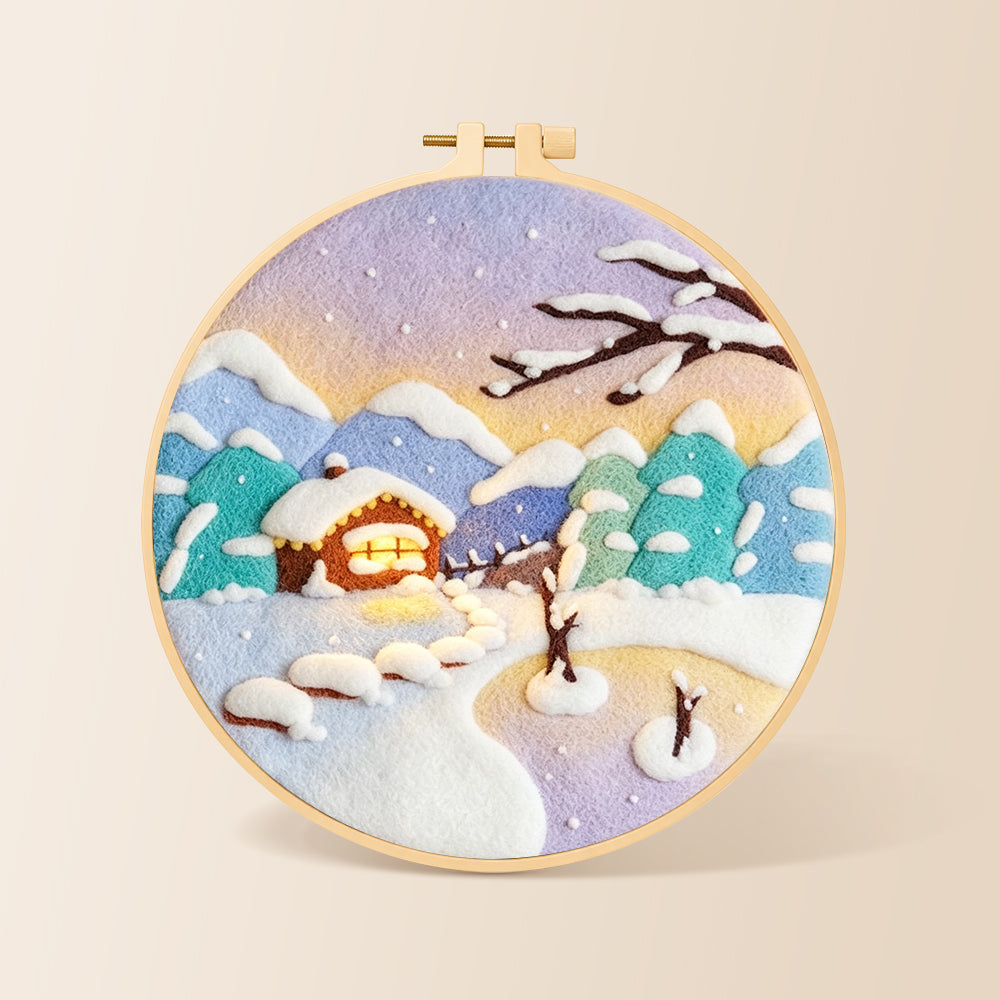 Pastel twilight snowy cabin needle felting kit for beginners with a round wooden frame