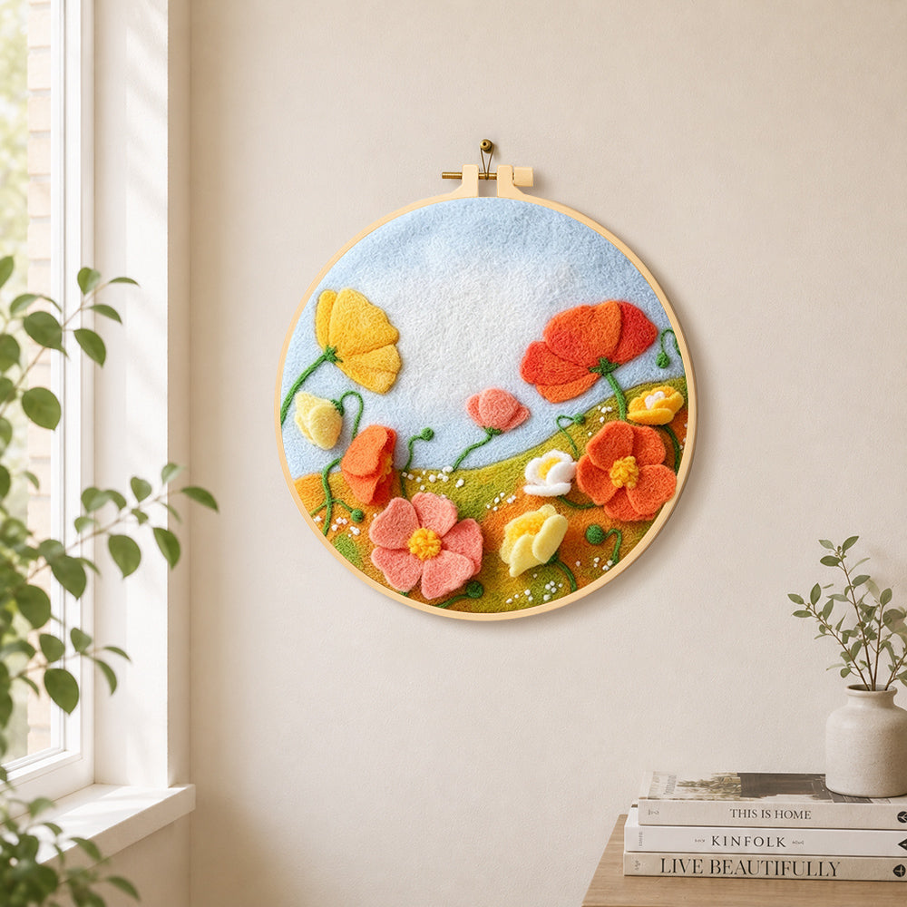 Pastel wildflower meadow needle felt wall art displayed in a bright home interior