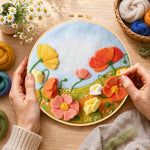 Creating the pastel wildflower meadow wool painting by hand with a felting needle