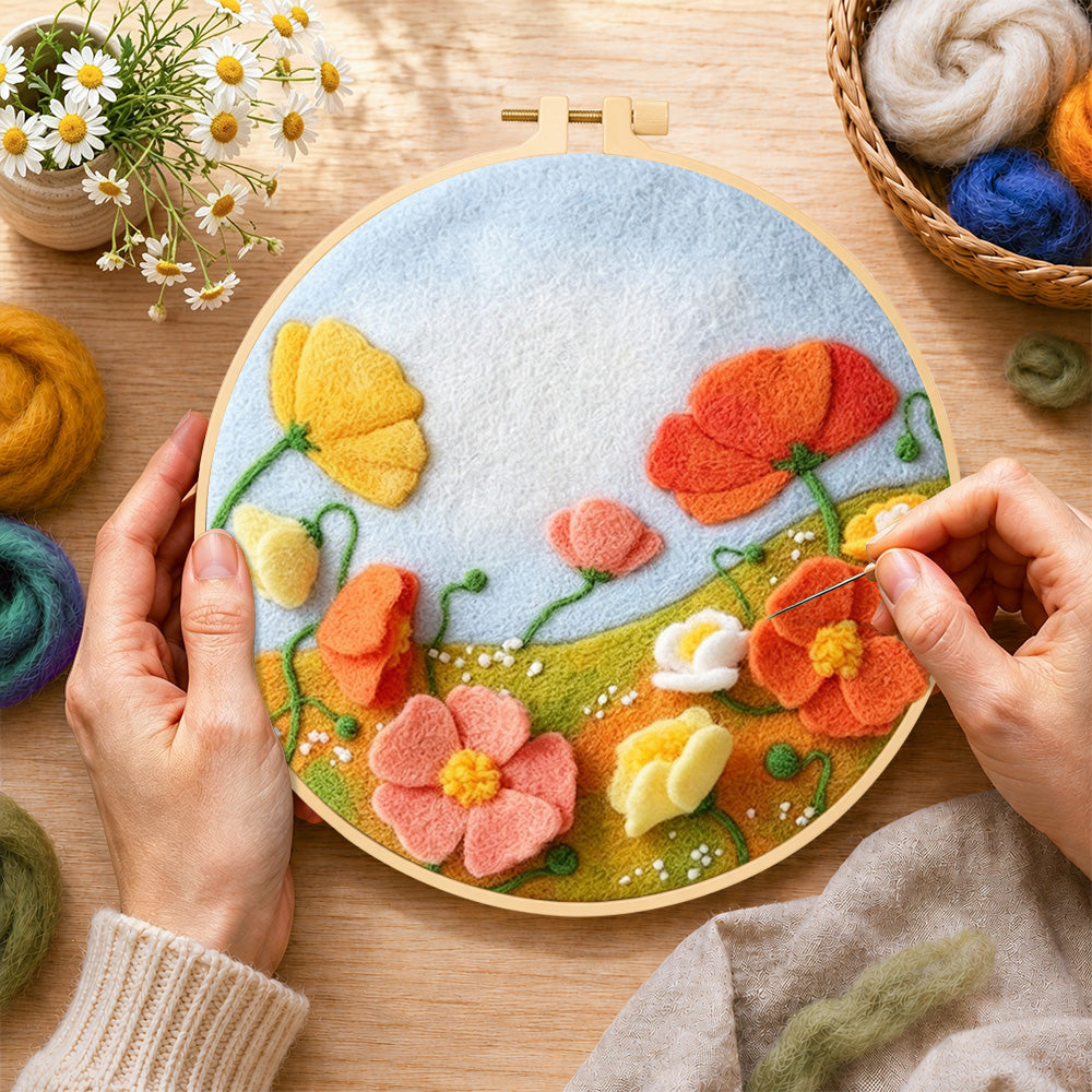 Creating the pastel wildflower meadow wool painting by hand with a felting needle