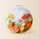 Pastel wildflower meadow needle felting kit for beginners with a round wooden frame