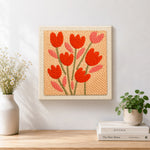 Finished peach tulips artwork displayed on a wall