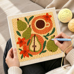 Creating handmade pear, coffee and flowers punch needle artwork