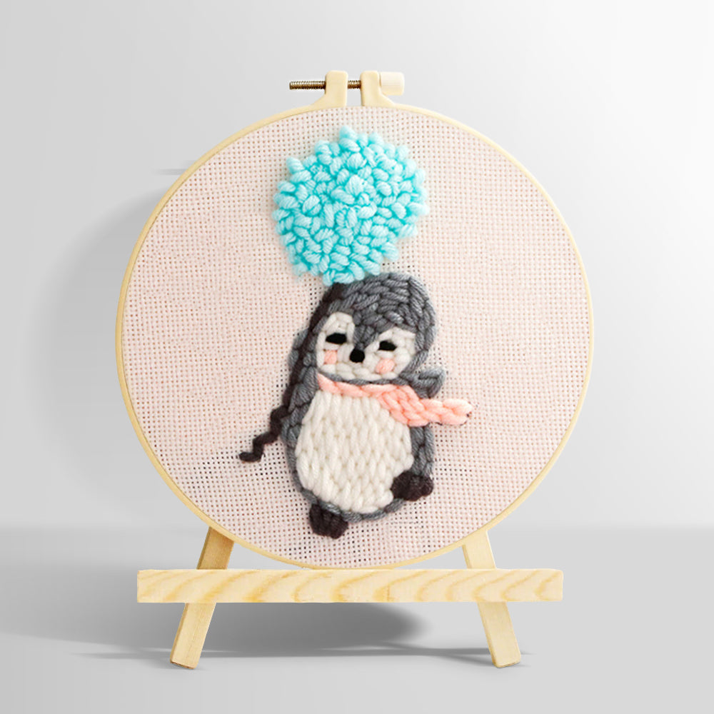 Penguin with blue balloon pom punch needle kit for beginners