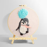 Penguin with blue balloon pom punch needle kit for beginners