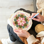 Creating handmade pink and green flower mandala punch needle artwork