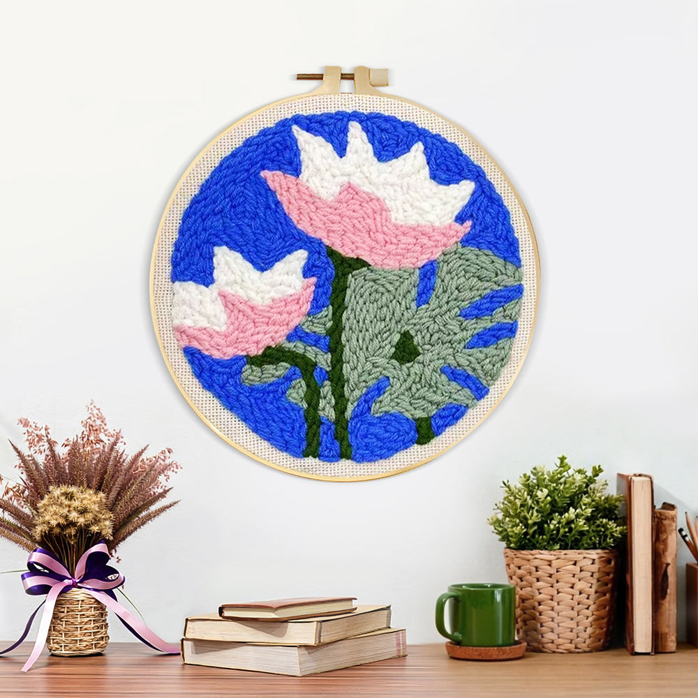 Finished pink and white lotus artwork displayed on a wall