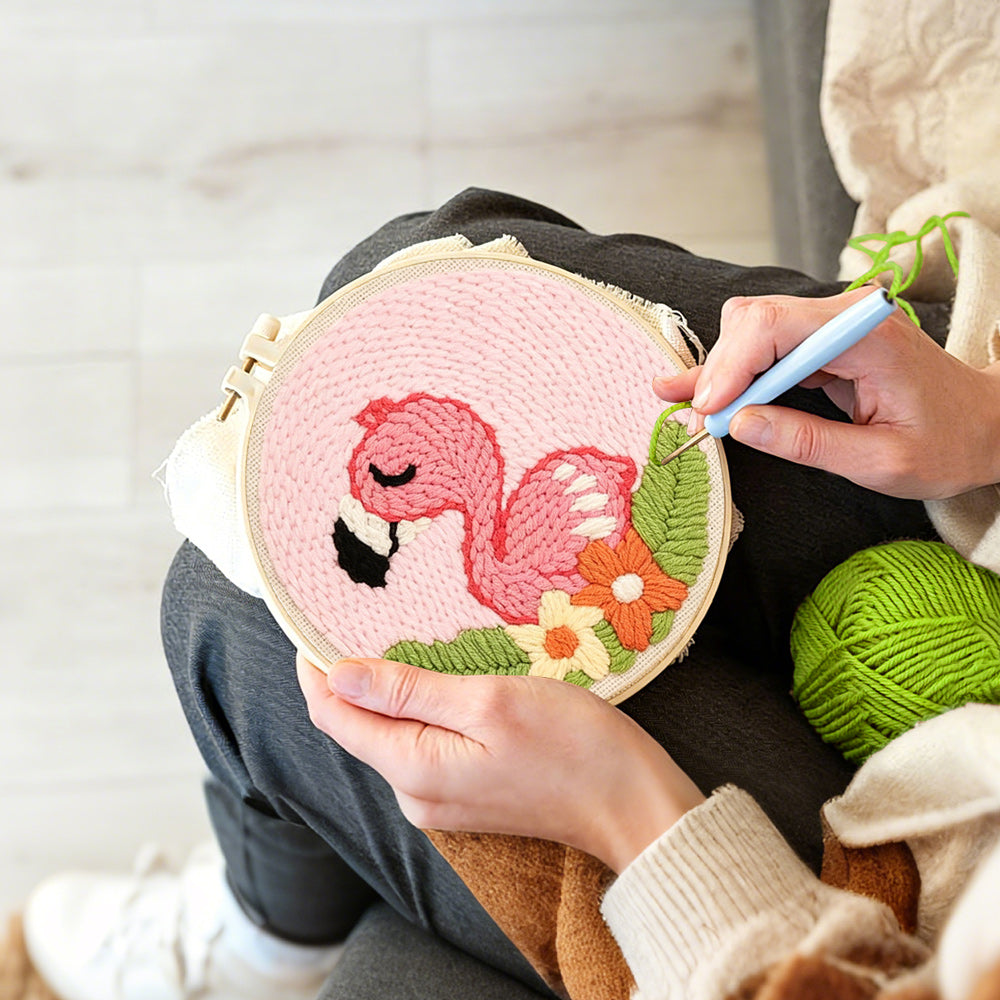Creating handmade pink baby flamingo punch needle artwork