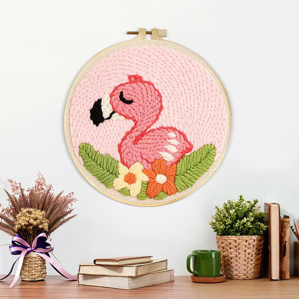 Finished pink baby flamingo artwork displayed on a wall