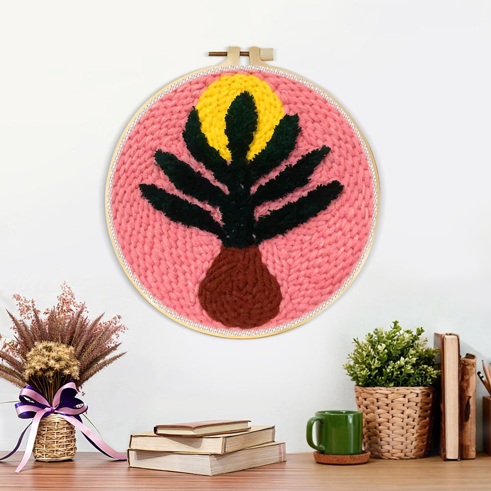 Finished pink background botanical vase artwork displayed on a wall